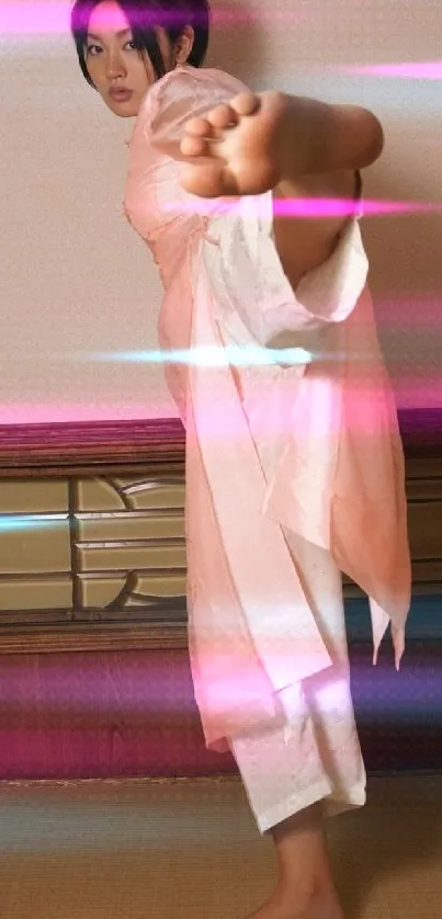 Woman in elegant martial arts pose wearing pink and white attire.