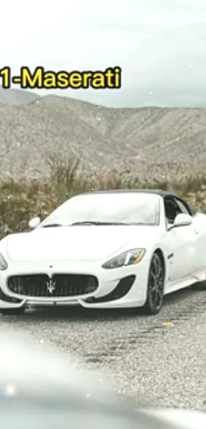 White Maserati driving through desert landscape, capturing elegance and adventure.