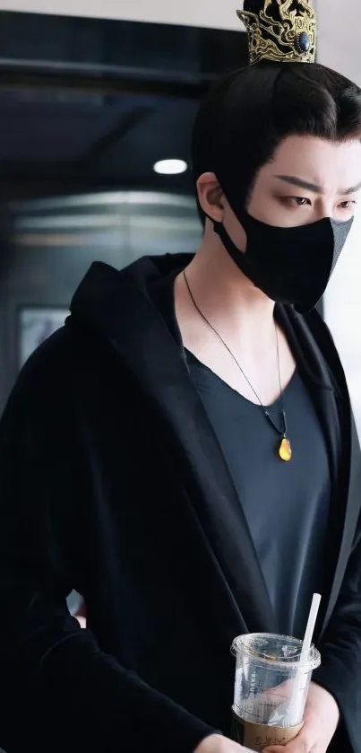 Mystical figure in black attire with a mask and necklace.