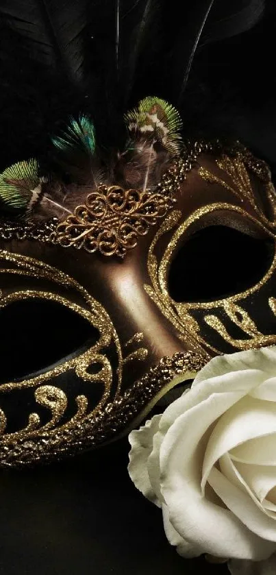 Elegant masquerade mask with gold detailing and a white rose.