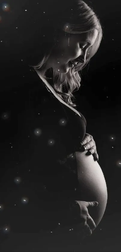 Elegant black and white maternity silhouette wallpaper.