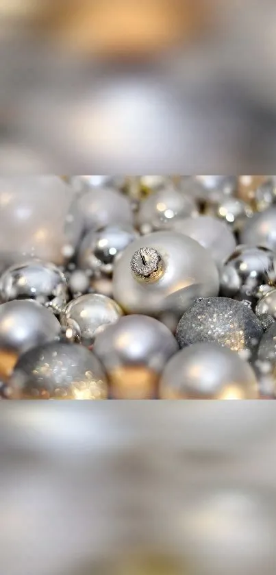 Elegant metallic ornaments with silver and gold shimmer for mobile wallpaper.