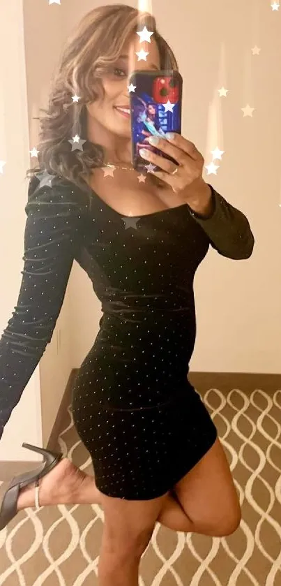 Stylish woman taking a mirror selfie in elegant attire.