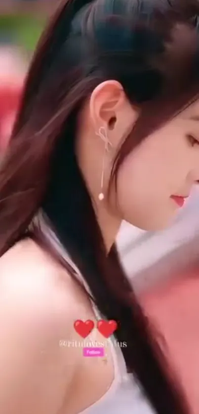Side profile of an elegant woman with soft background colors.