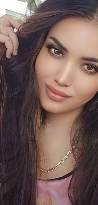 Beautiful woman with long hair mobile wallpaper.