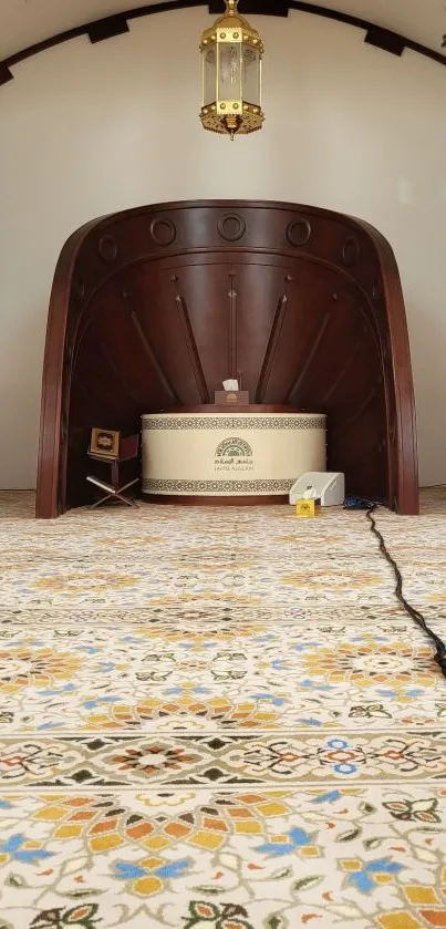 Elegant mosque interior with intricate carpet patterns and a beautifully designed Mihrab.