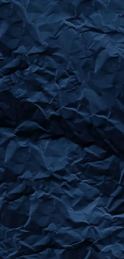 Navy crumpled texture wallpaper for mobile screen.