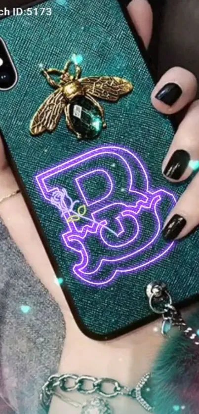 Stylish phone wallpaper with neon and golden insect design on a teal case.