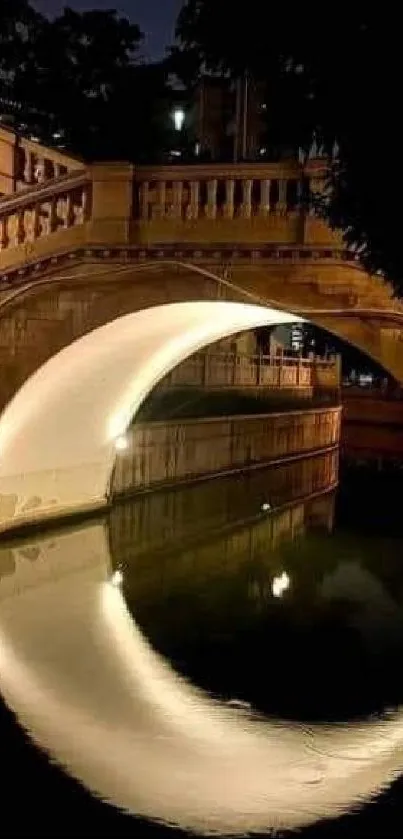 Bridge with soft lights reflecting on a river at night.