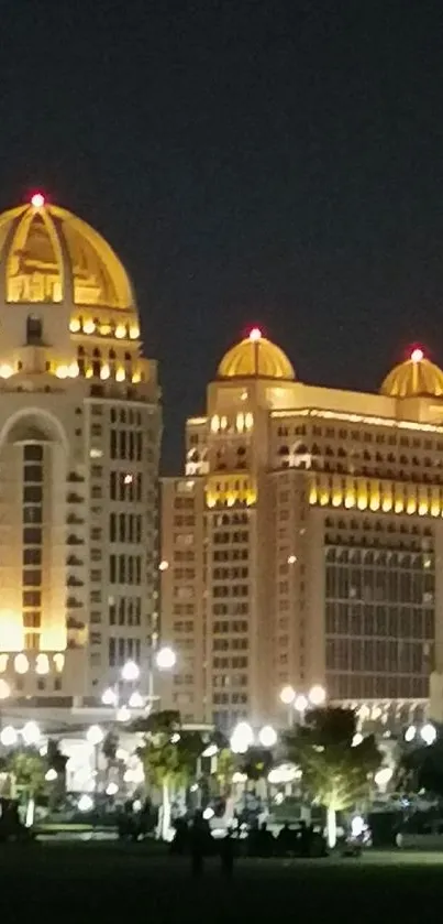 Majestic cityscape with golden illumination at night.