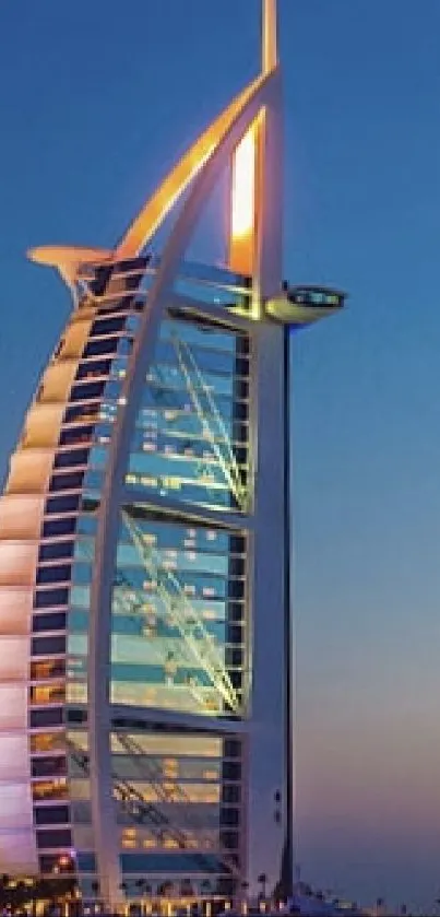 A striking building against a blue night sky, showcasing modern architecture.