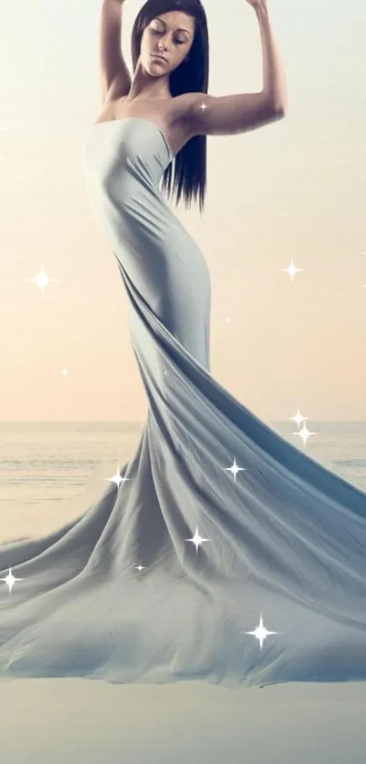 Graceful woman in elegant flowing dress by the ocean.