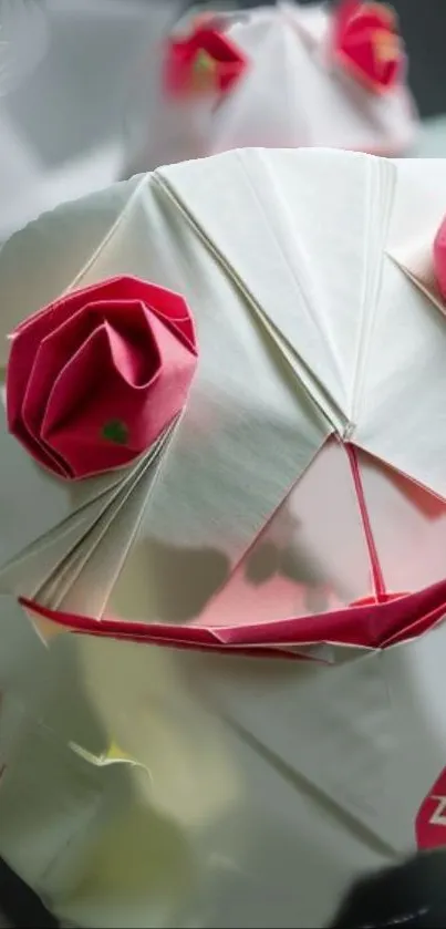 A white and pink floral origami art design.