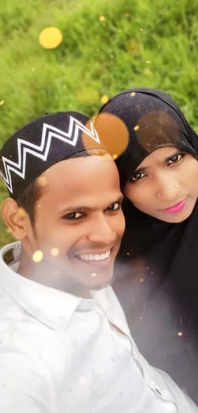 Smiling couple posing in nature, vibrant outdoor shot.