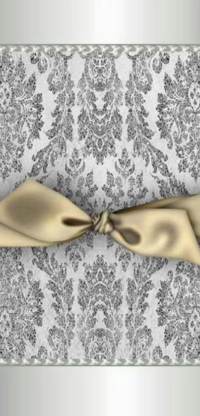 Elegant wallpaper with damask pattern, gold ribbon, pearls, and diamonds.