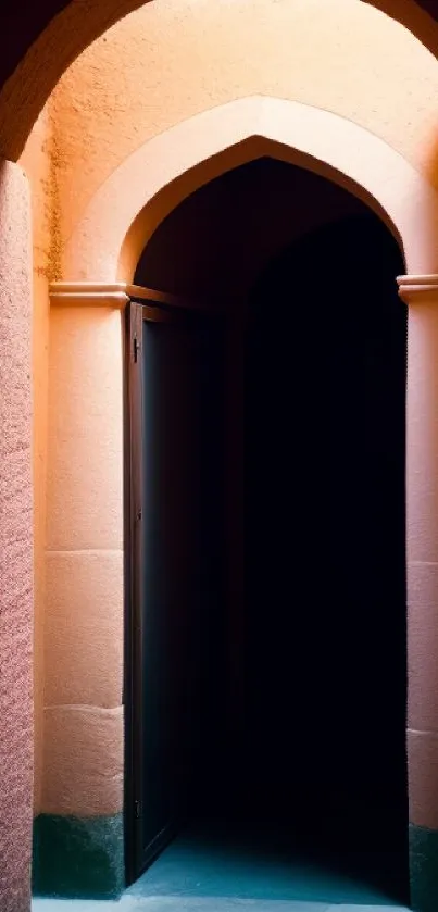 Elegant peach-colored archway with open door in soft lighting.