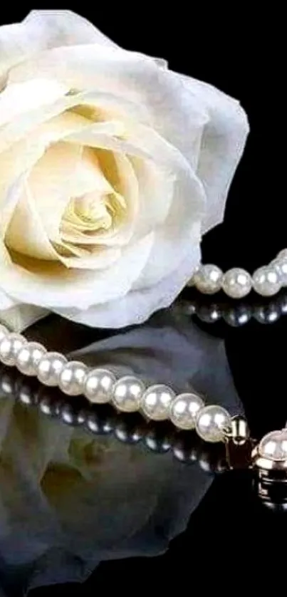 Elegant white rose with pearl necklace wallpaper.