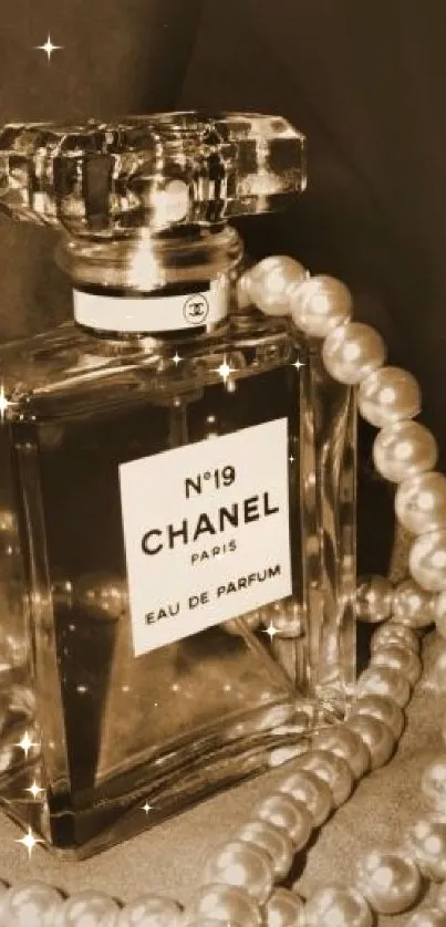 Chanel perfume bottle with pearls in sepia tone, elegant and vintage style.