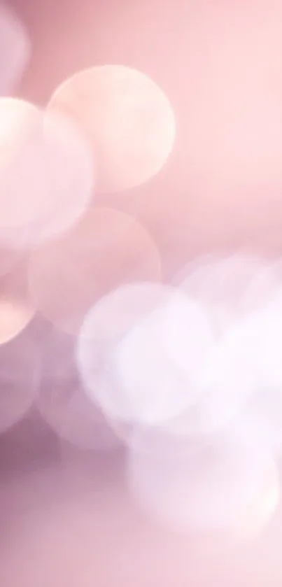 Pink bokeh wallpaper with elegant, soft, dreamy light circles.