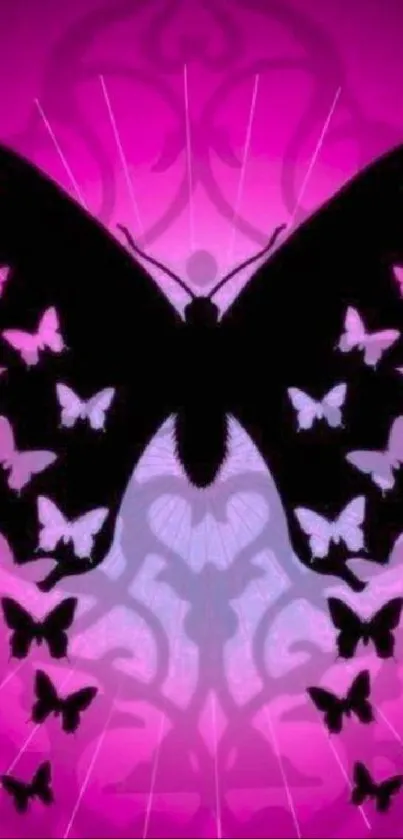 Pink wallpaper with black butterfly silhouette and multiple smaller butterflies.