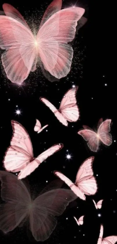 Elegant pink butterflies on a black background wallpaper.