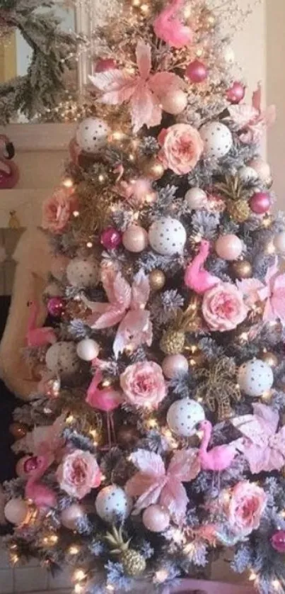 Pink Christmas tree with elegant decor and festive ornaments.