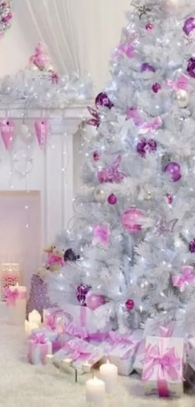 White Christmas tree with pink and purple decorations in a cozy setting.