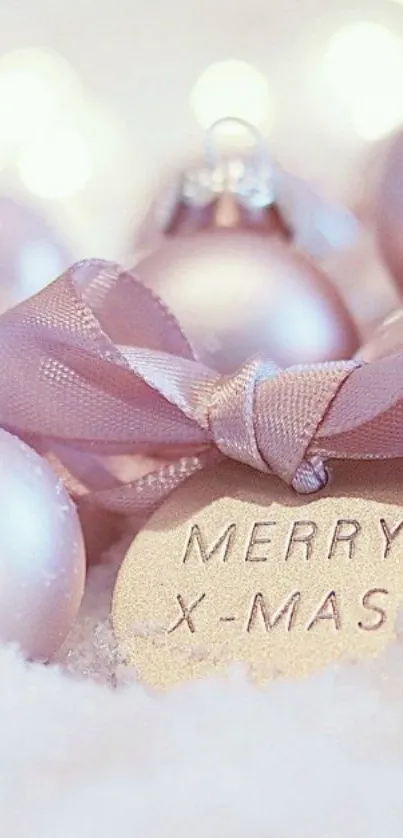 Elegant pink Christmas wallpaper with ornaments and Merry X-Mas tag.