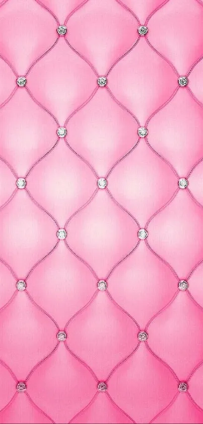 Elegant pink wallpaper with diamond-studded patterns.