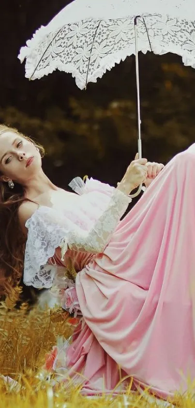 Woman in pink dress with lace umbrella in outdoor setting.