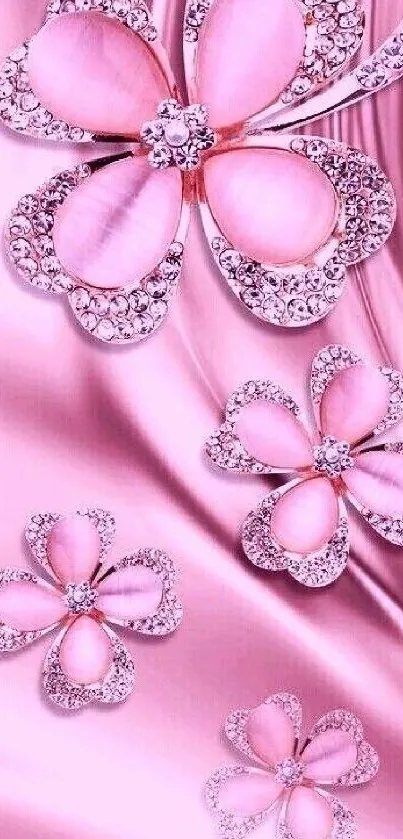 Luxurious pink floral wallpaper with jeweled flowers on silky background.