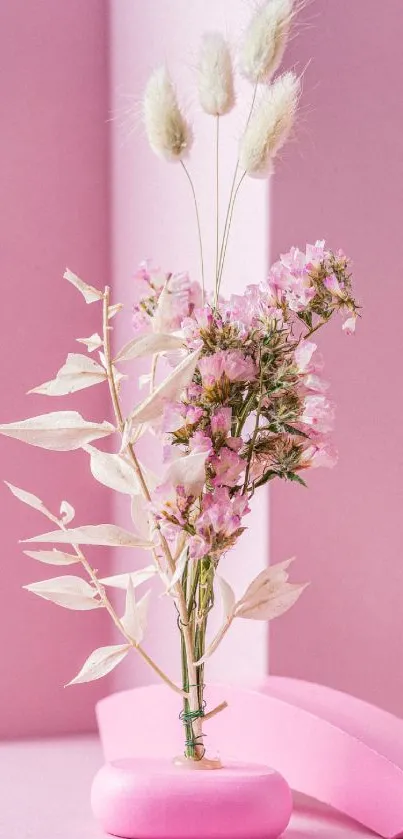 Elegant pink floral arrangement with soft pastel hues.