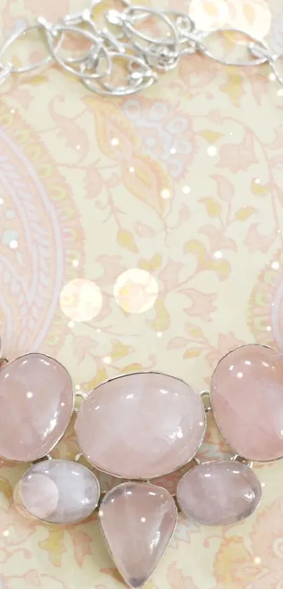 Elegant pink gemstone bracelet on pastel background.