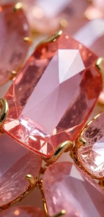 Elegant pink crystal gemstones with gold accents background.