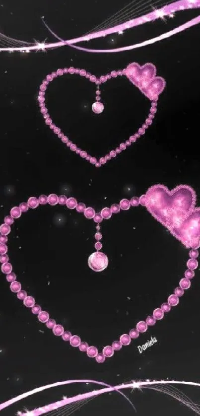 Elegant pink pearl heart design on black background wallpaper.