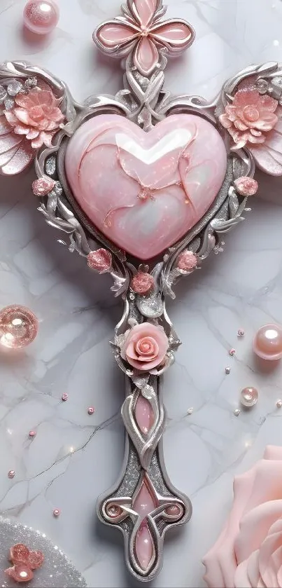 Elegant ornament with pink heart and wings on marble background.