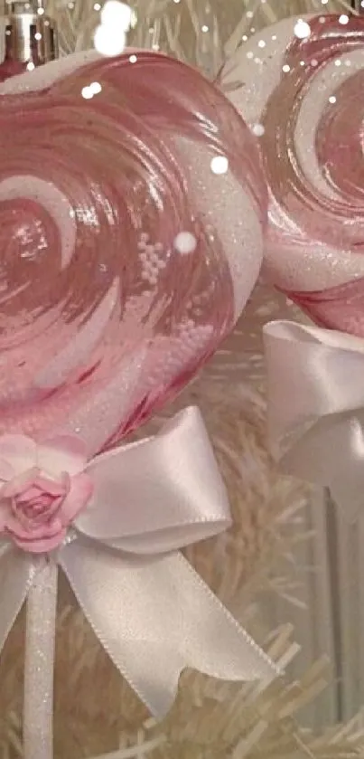 Pink heart ornaments with ribbons on a tree, creating an elegant festive look.