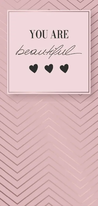 Elegant pink wallpaper with uplifting quote and chevron pattern.