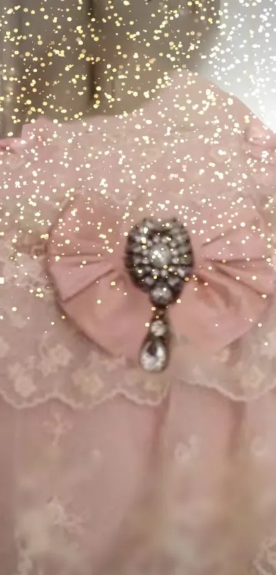 Elegant pink lace with gemstone brooch and delicate gold accents.