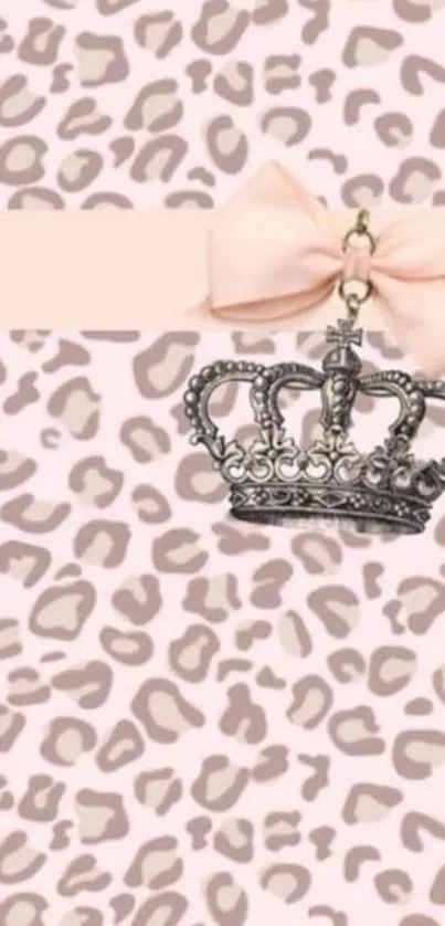 Pink leopard print wallpaper with a crown and ribbon.