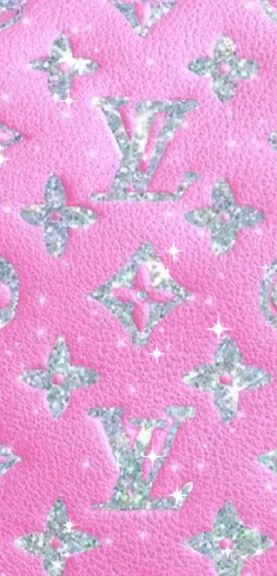 Pink wallpaper with elegant monogram pattern and shimmering details.