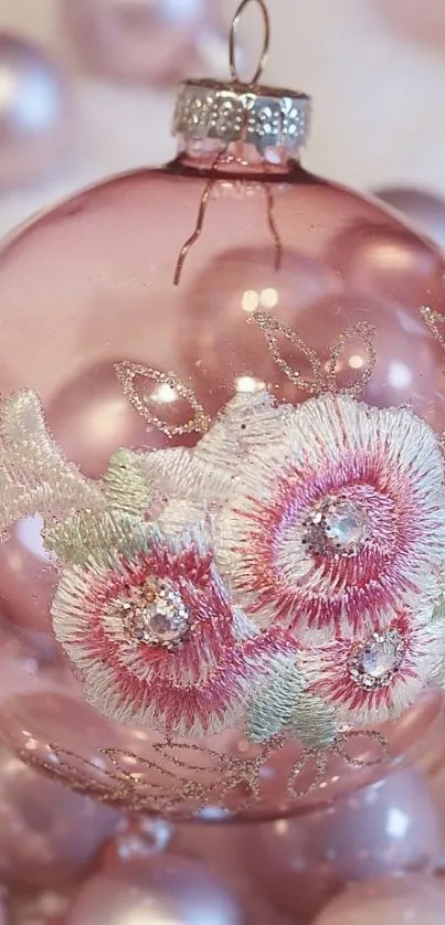 Elegant pink ornament with floral design.