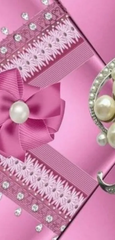 Elegant pink wallpaper with pearls and bow design.