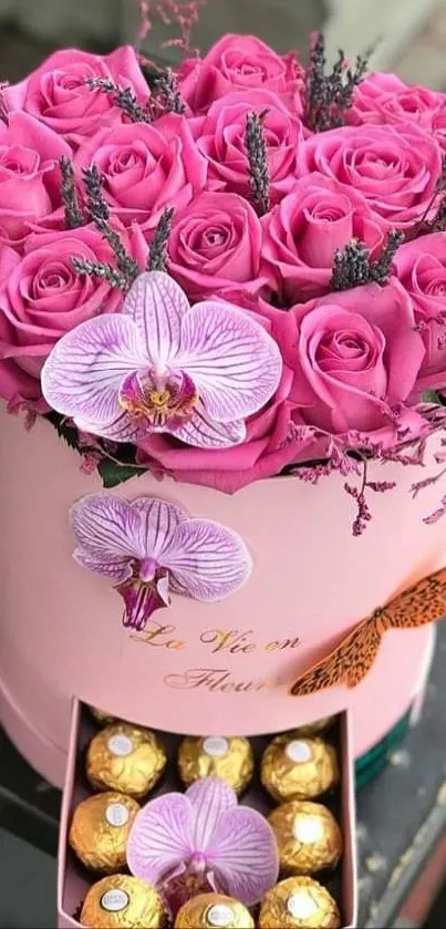 Pink rose bouquet with orchid and chocolates.