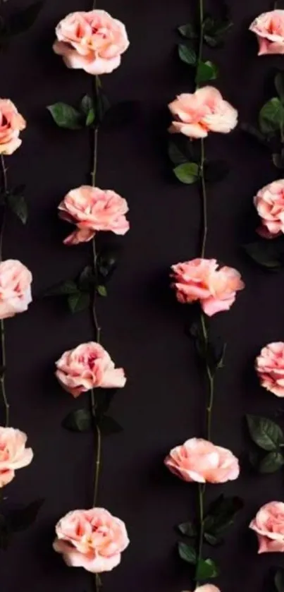 Vertical pattern of pink roses on black background.