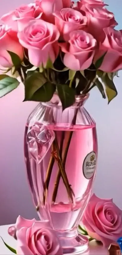Pink roses beautifully arranged in a clear glass vase.