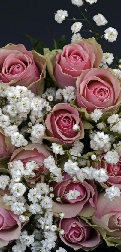 Elegant bouquet of pink roses with white flowers.