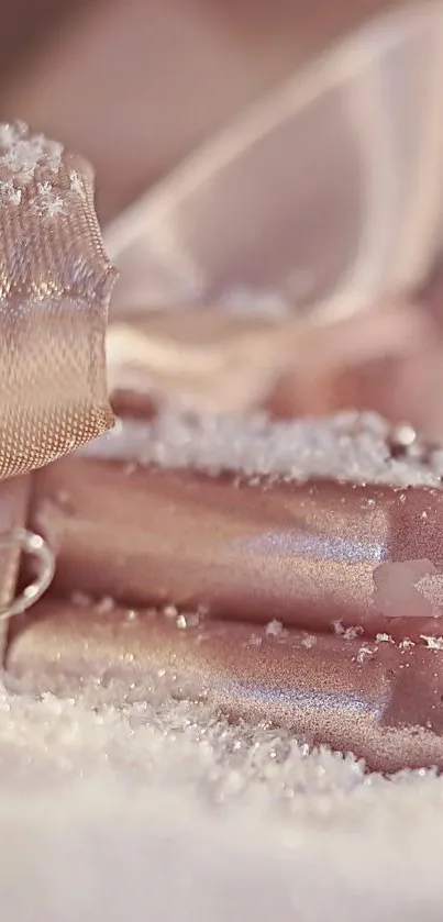 Soft pink candles with snowflakes create an elegant winter look.