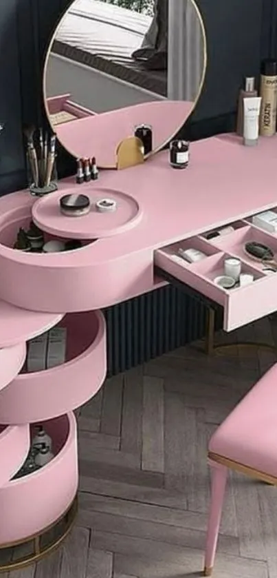 Elegant pink vanity setup with storage drawers.