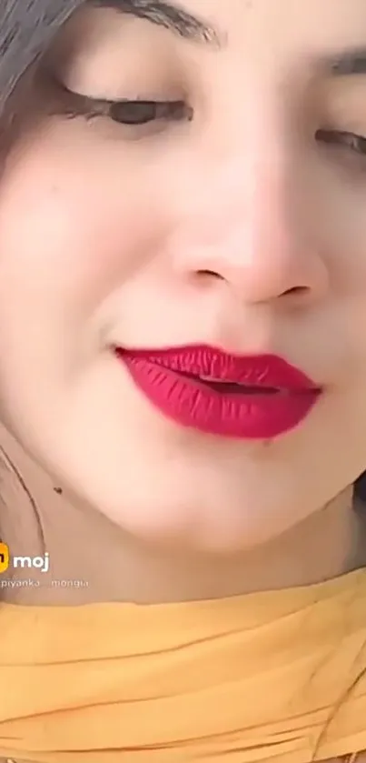 Close-up portrait mobile wallpaper featuring vibrant red lips.